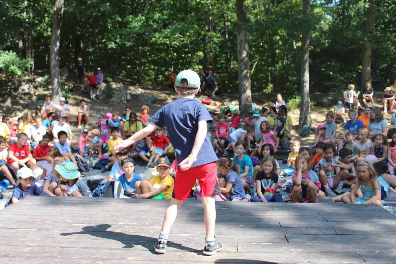 Kid dancing at talent show.