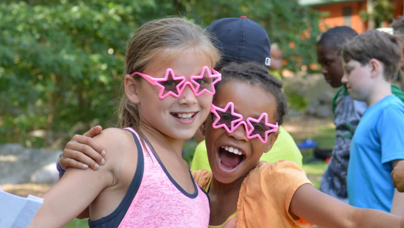 Kids in star-shaped sunglasses.