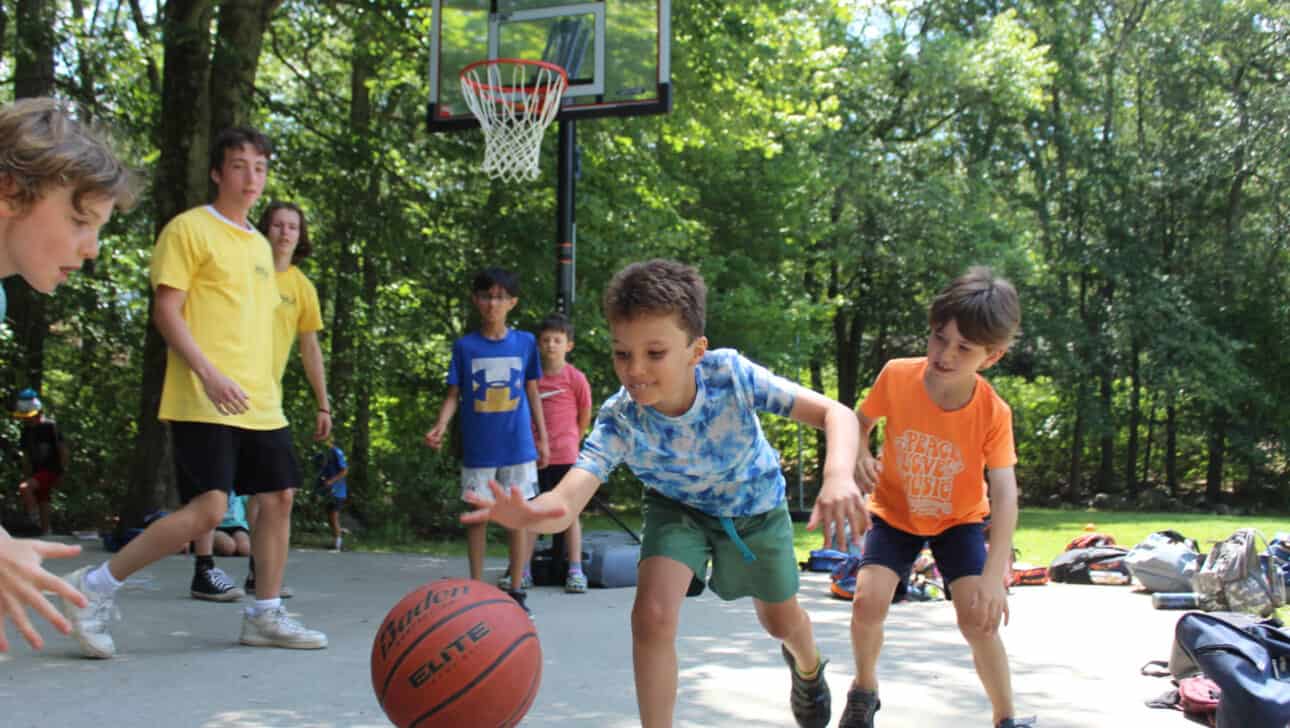 Campers playing basketball.