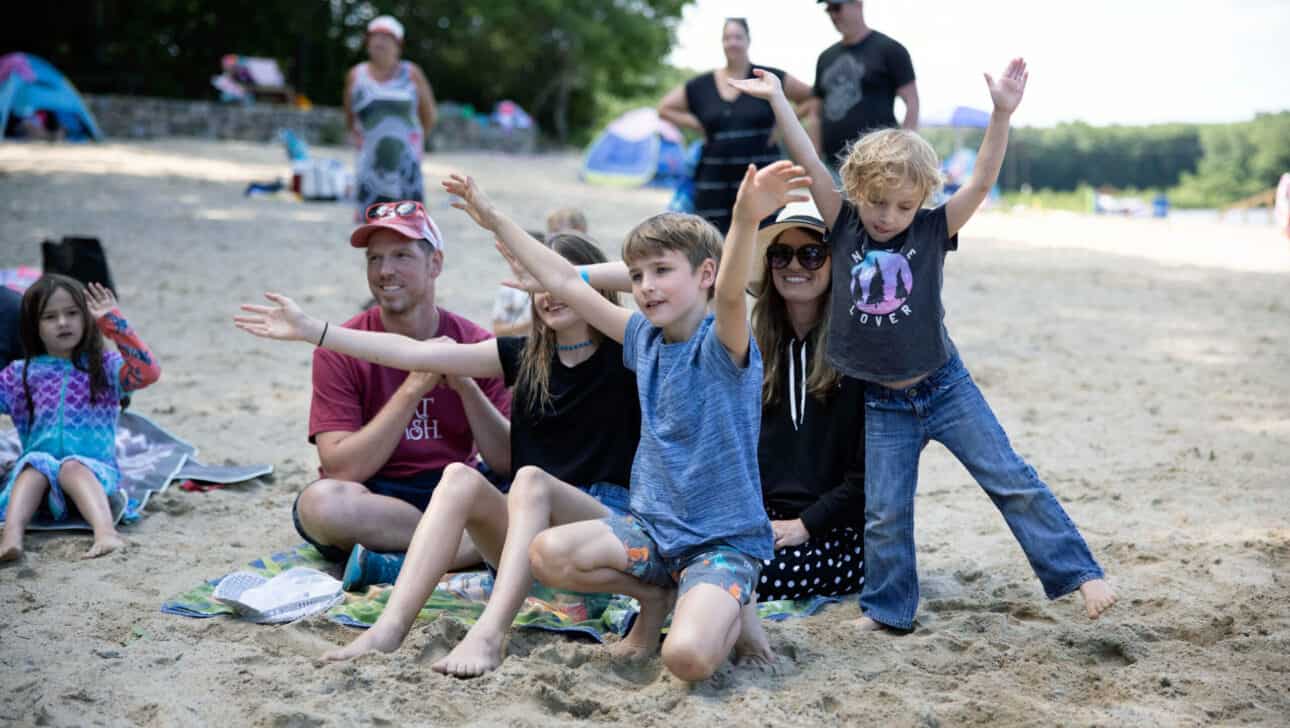 Family having fun on the beach.