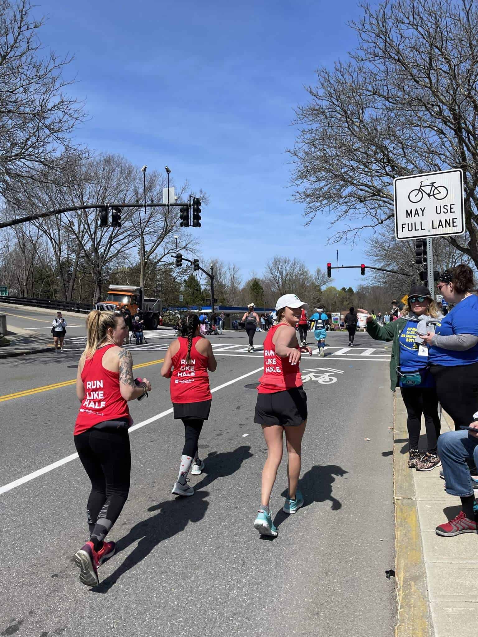 Runners complete the Boston Marathon together