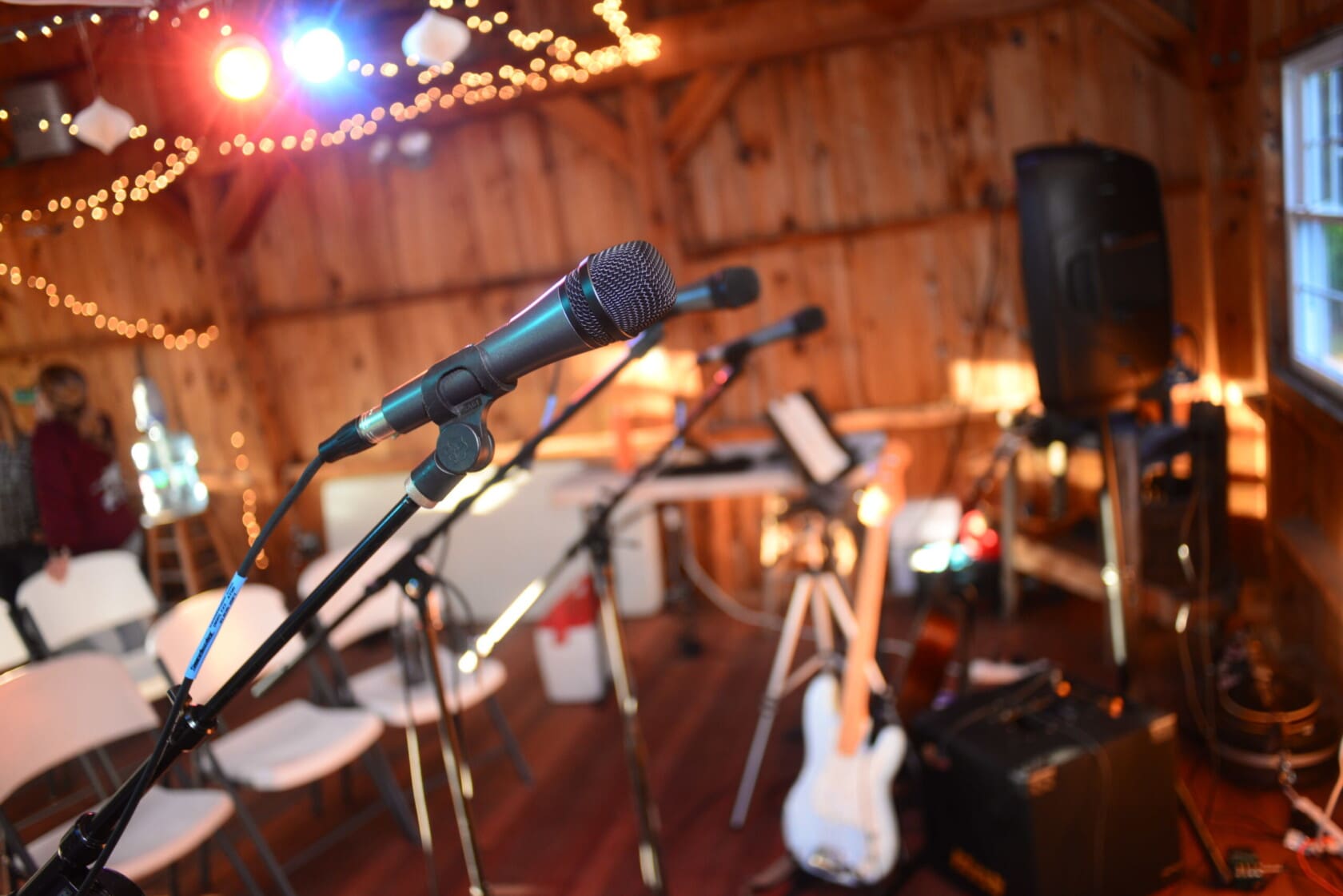 Microphones and lights are ready for a musician to take the stage.