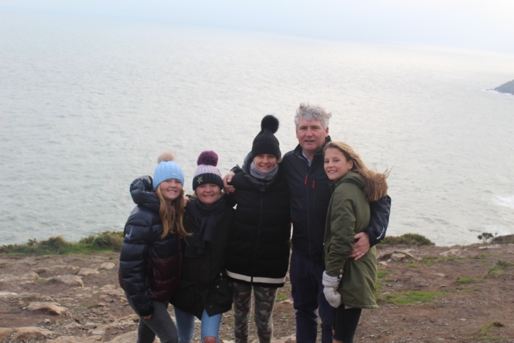 The Hauck family on a rocky beach in Ireland