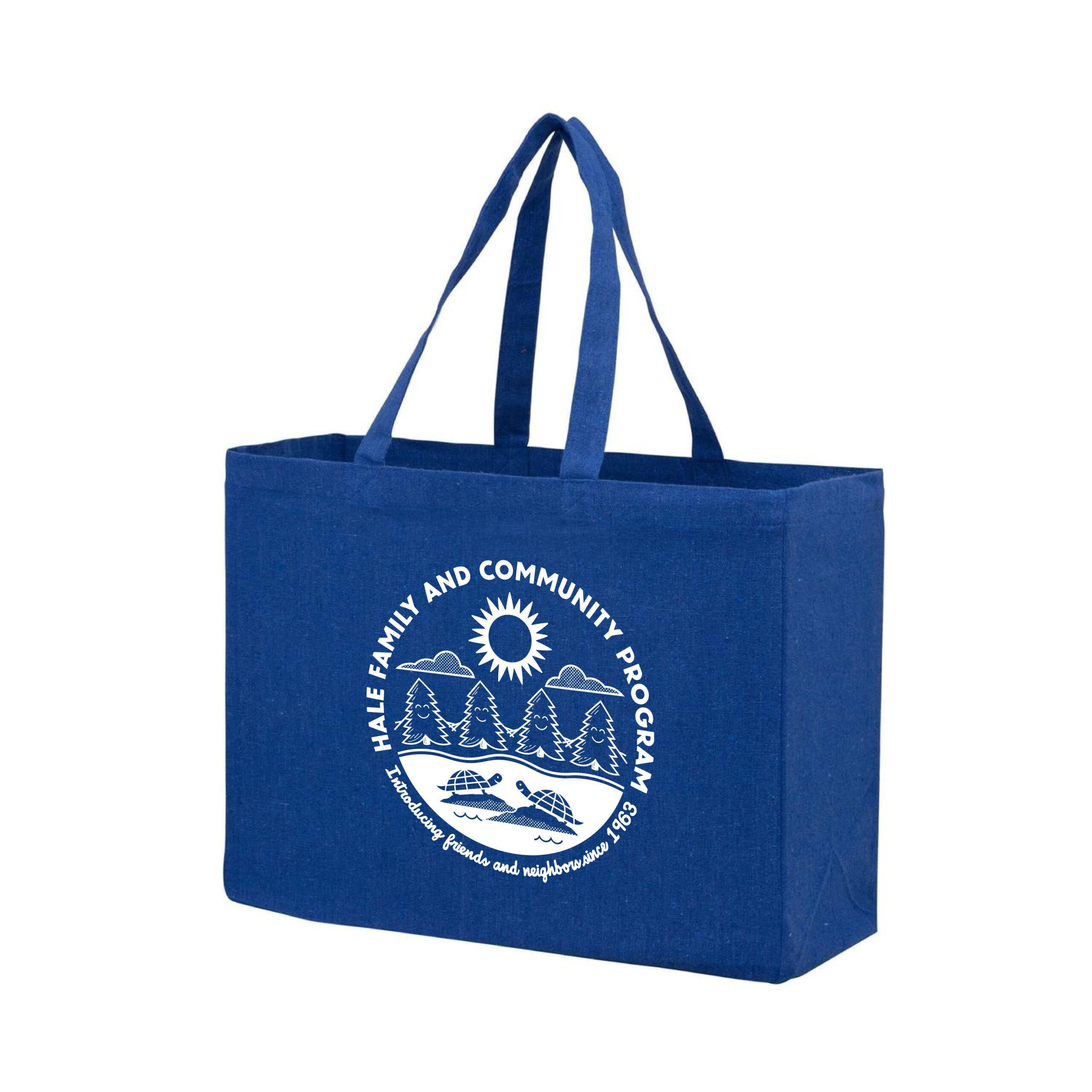 A blue fabric tote bag with two handles, featuring a white printed logo that reads "MALE FAMILY AND COMMUNITY PROGRAM" with a scenic design and additional text below.