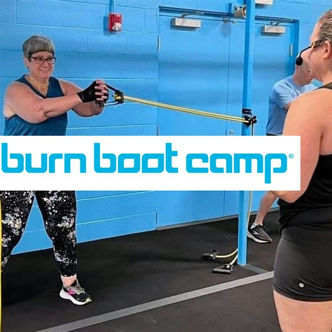 Two women exercise with resistance bands in a fitness studio with blue walls. One woman instructs while the other performs the exercise. "Burn Boot Camp" logo overlays the image.