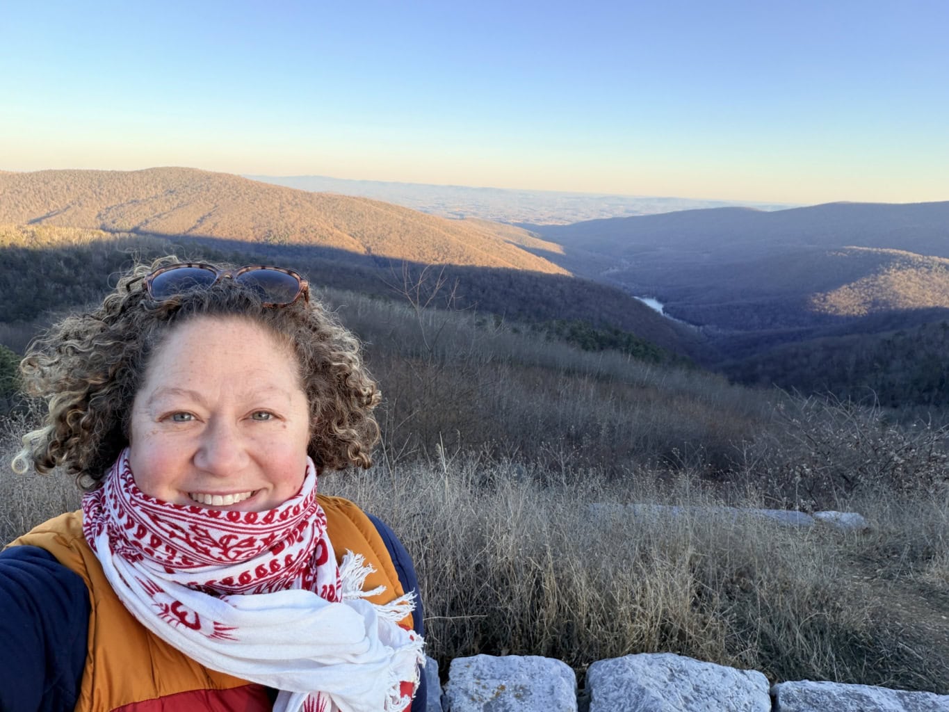 woman in front of mountains